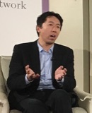 Andrew Ng speaking at a 2017 AI dinner